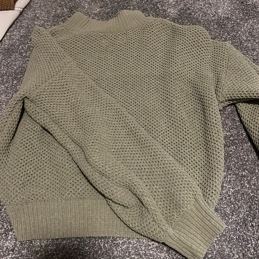 This is a green size small Hollister sweater.